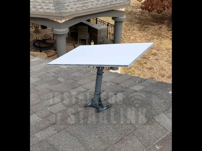 A completed Starlink gen 3 install using a pivot mount to a standard shingle composite roof of a home, done by our installers.