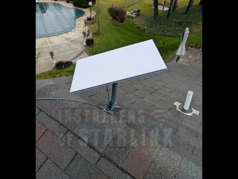 A completed Starlink gen 3 install using a pivot mount to the standard shingle composite roof of a two story home, done by our expert installers.
