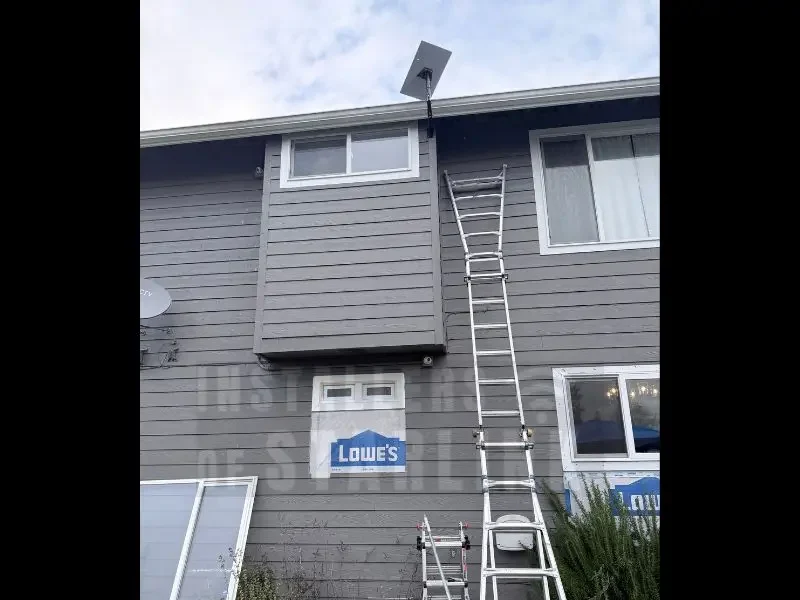 A completed Starlink gen 3 install using an under eave wall mount on a two story home, done by our professional installers.